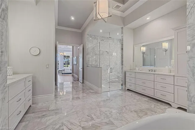 a bedroom with a bed and a book shelf