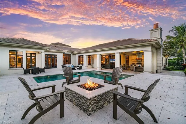 a view of a lake with a house