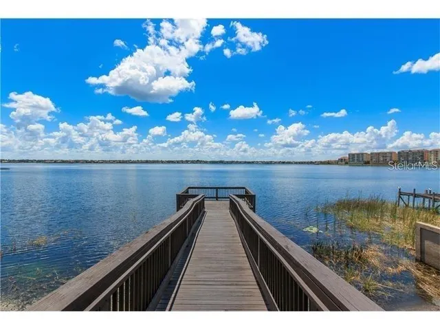a view of a lake from a balcony