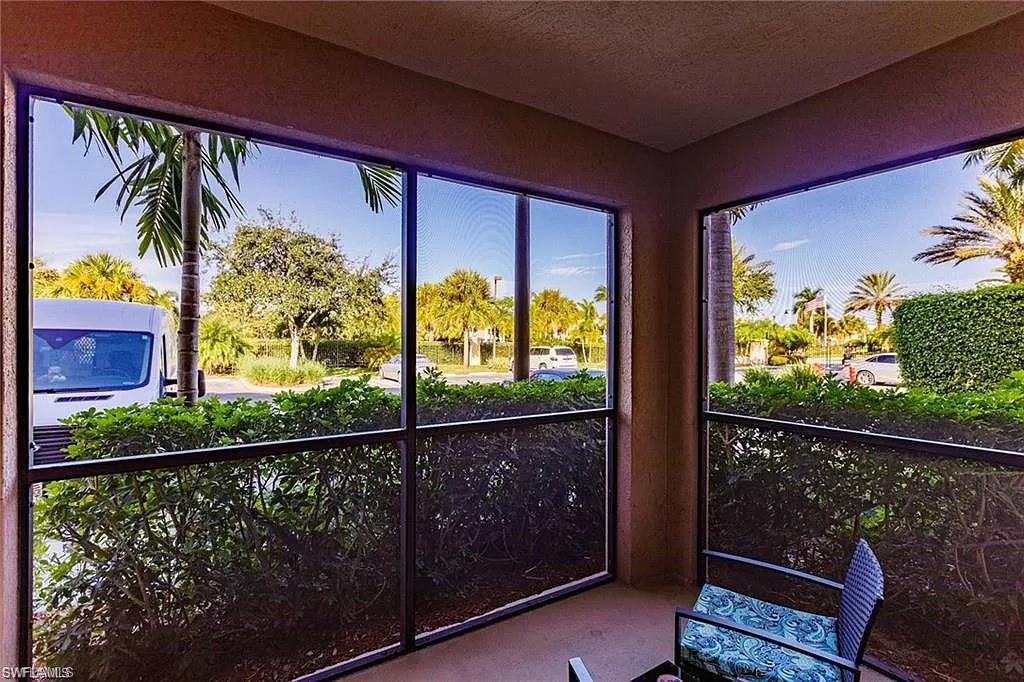 13010 Positano Circle, Unit 101 Naples, FL 34105 - Photo 28 of 29 a view of a street from a balcony