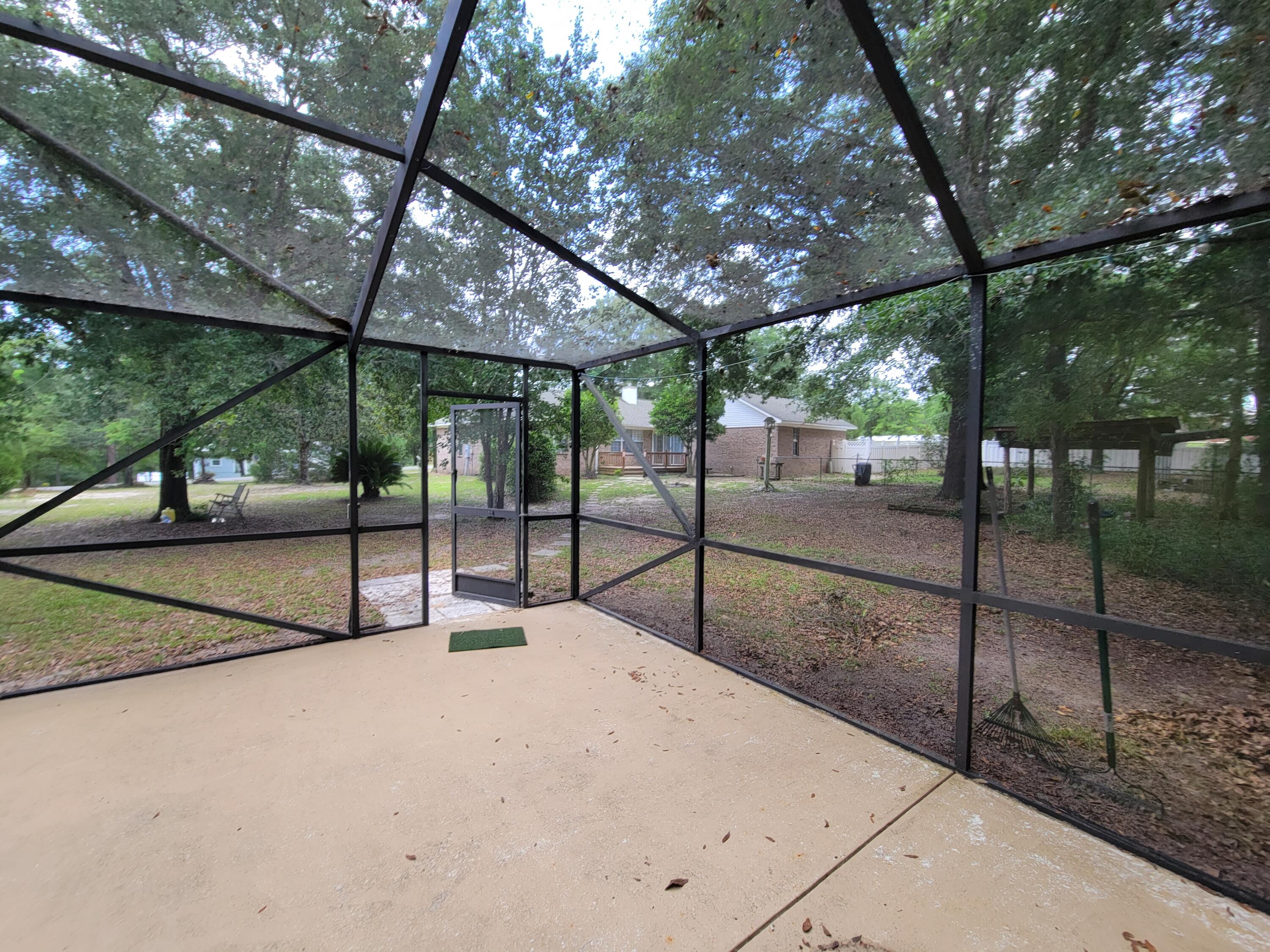 45 Hidden Lakes Trail DeFuniak Springs, FL 32433 - Photo 5 of 39 a view of a backyard