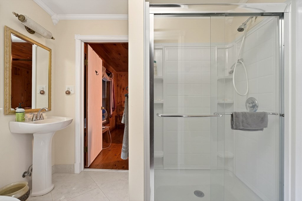1932 Holly Creek Road Celina, TN 38551 - Photo 13 of 31 a bathroom with a shower and a sink