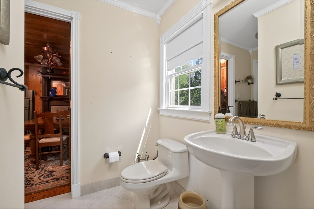 1932 Holly Creek Road Celina, TN 38551 - Photo 14 of 31 a bathroom with a sink and a mirror