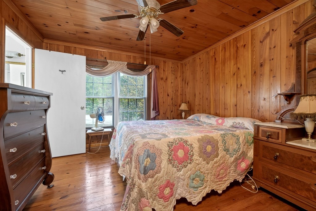 1932 Holly Creek Road Celina, TN 38551 - Photo 16 of 31 a bedroom with a bed and large window