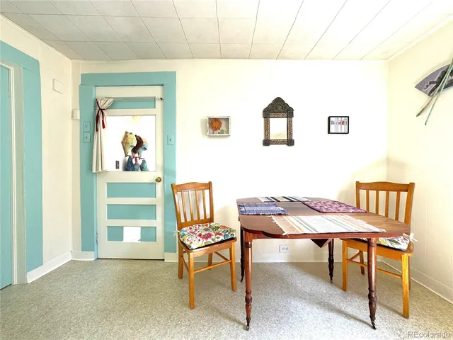 a view of a workspace with furniture