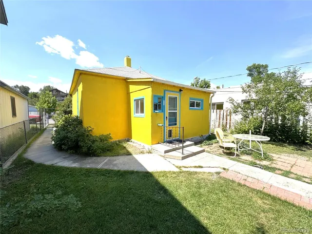 a view of a backyard with a garden