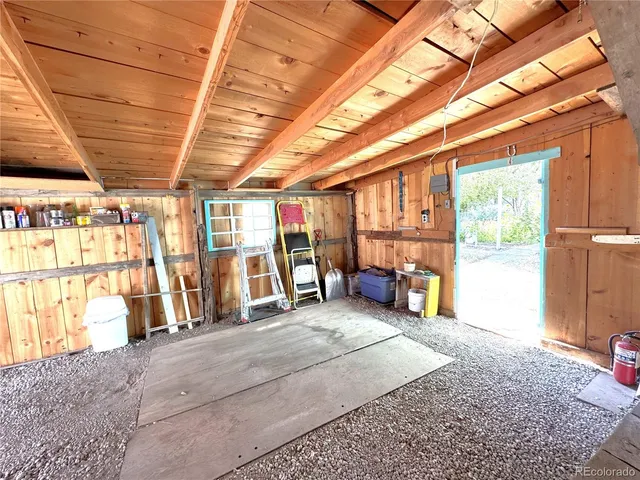 a view of a room with wooden roof