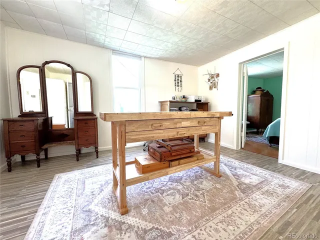 a living room with a couch and a table