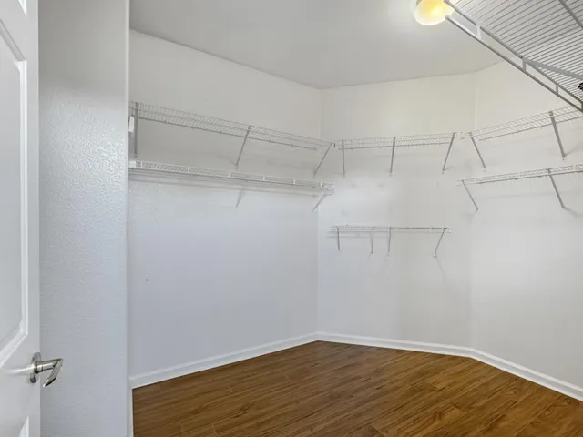 a view of a room with racks on the wall