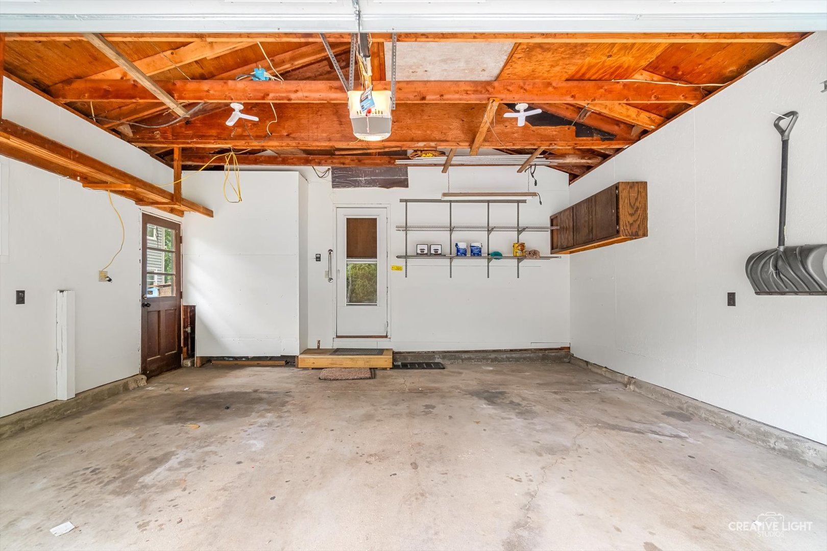 1483 Nova Road Sandwich, IL 60548 - Photo 20 of 29 a view of a room with wooden walls