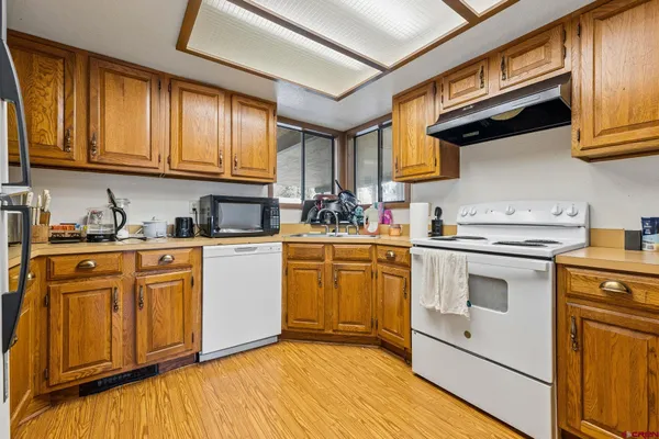 a room with furniture and a large window
