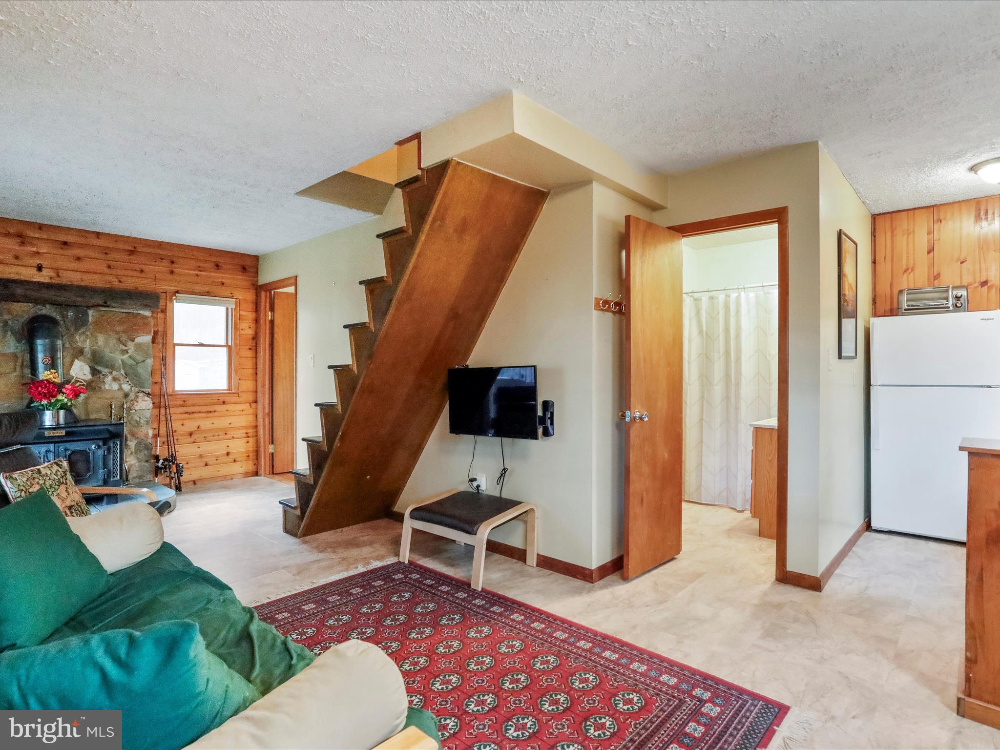 233 High Cliff Road Capon Bridge, WV 26711 - Photo 24 of 42 Stairs to Upper Level & Main Level Full Bath entry