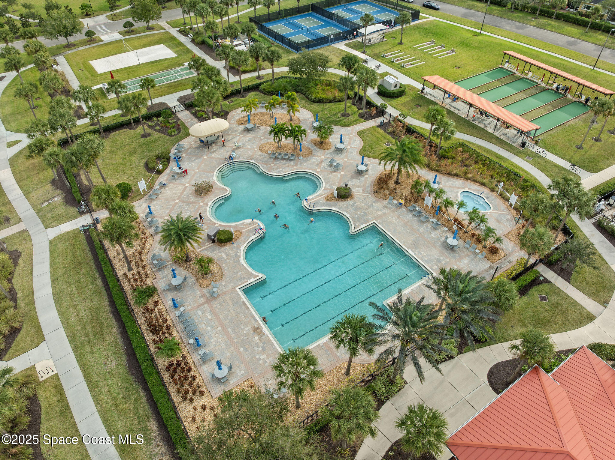 7248 Broderick Drive Melbourne, FL 32940 - Photo 34 of 51 an aerial view of a pool