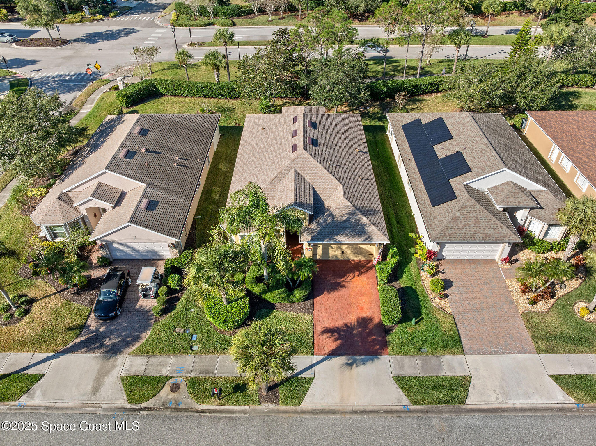 7248 Broderick Drive Melbourne, FL 32940 - Photo 4 of 51 an aerial view of residential houses with outdoor space