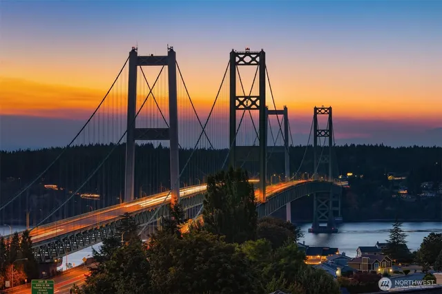 a view of a backyard with a lake view
