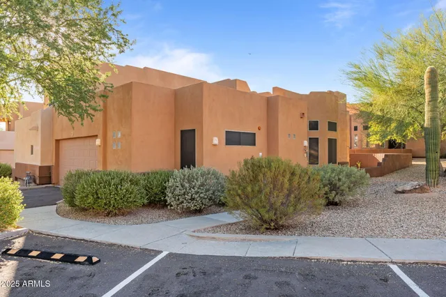 a view of a street with a building in the background