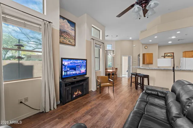 a large kitchen with granite countertop a large island in the center