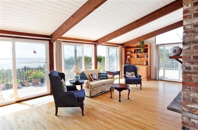805 Chequessett Neck Road Wellfleet, MA 02667 - Photo 15 of 31 a living room with furniture and a wooden floor