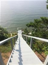 805 Chequessett Neck Road Wellfleet, MA 02667 - Photo 24 of 31 a view of a balcony with ocean view