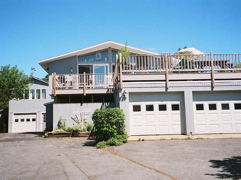805 Chequessett Neck Road Wellfleet, MA 02667 - Photo 10 of 31 front view of a house with a street