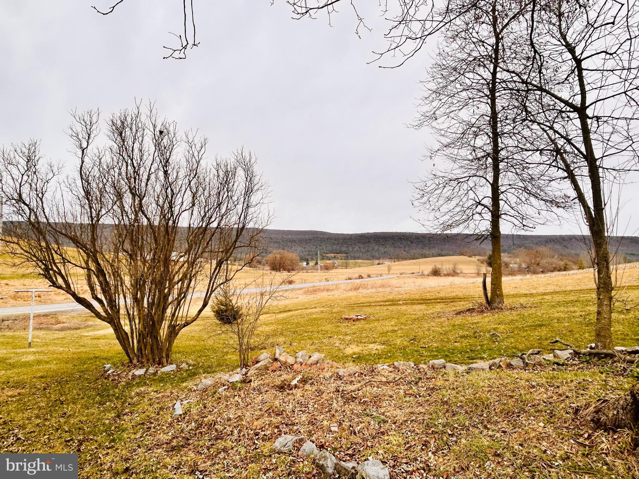 104 Apple Butter Road Aaronsburg, PA 16820 - Photo 11 of 33 a view of an ocean with a trees