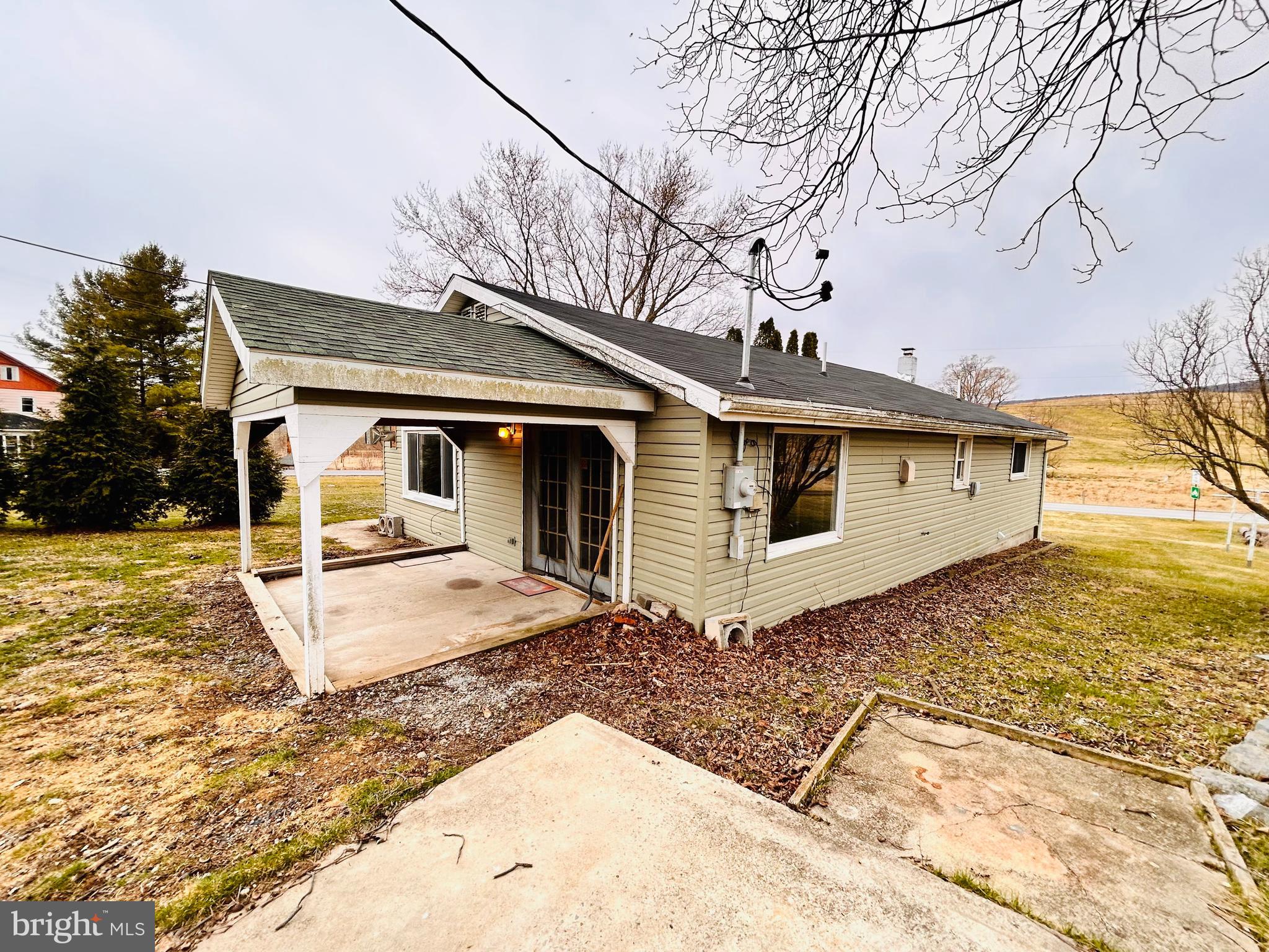 104 Apple Butter Road Aaronsburg, PA 16820 - Photo 15 of 33 a front view of a house with yard