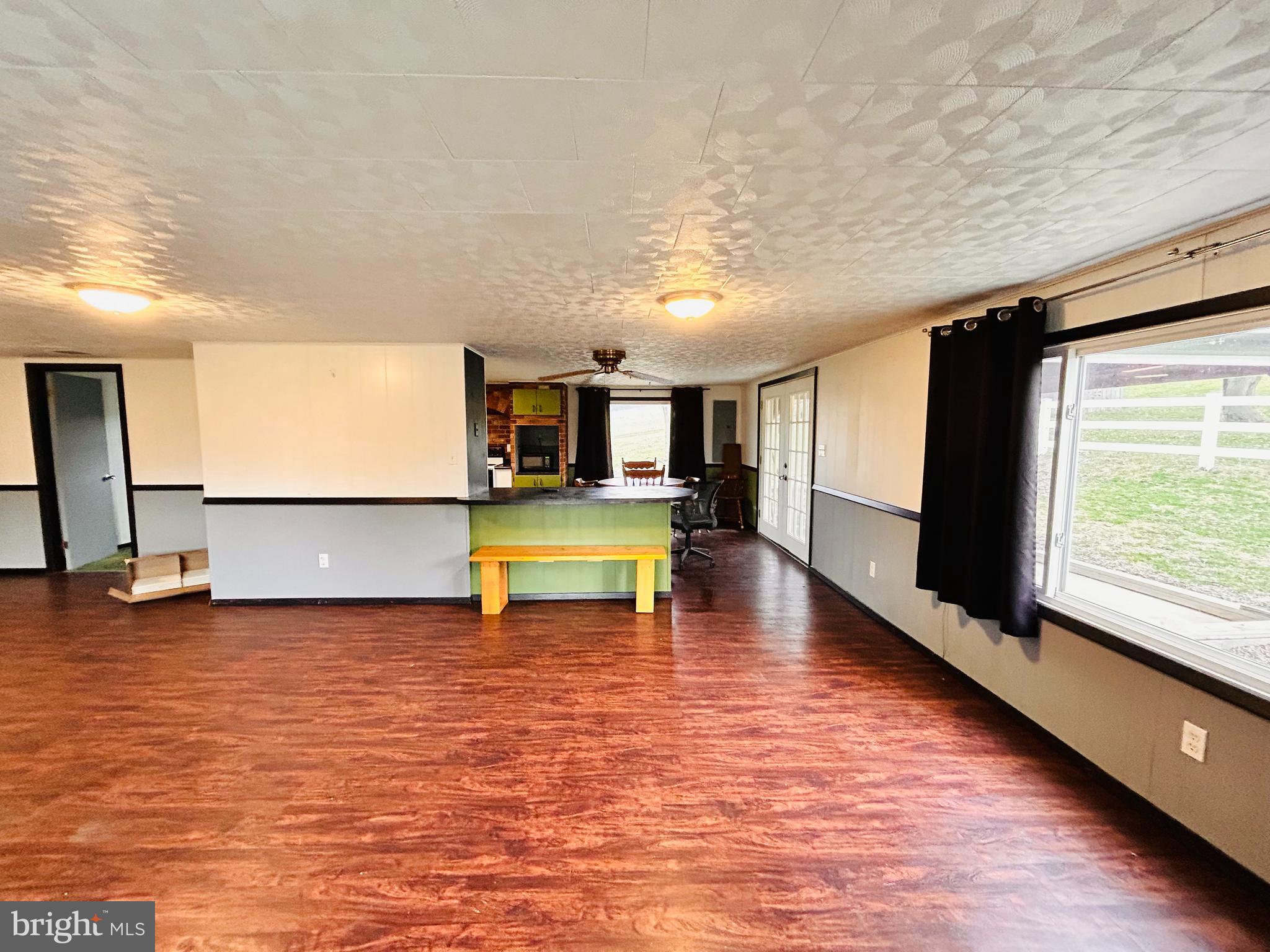 104 Apple Butter Road Aaronsburg, PA 16820 - Photo 18 of 33 a room with pool table and a floor to ceiling window