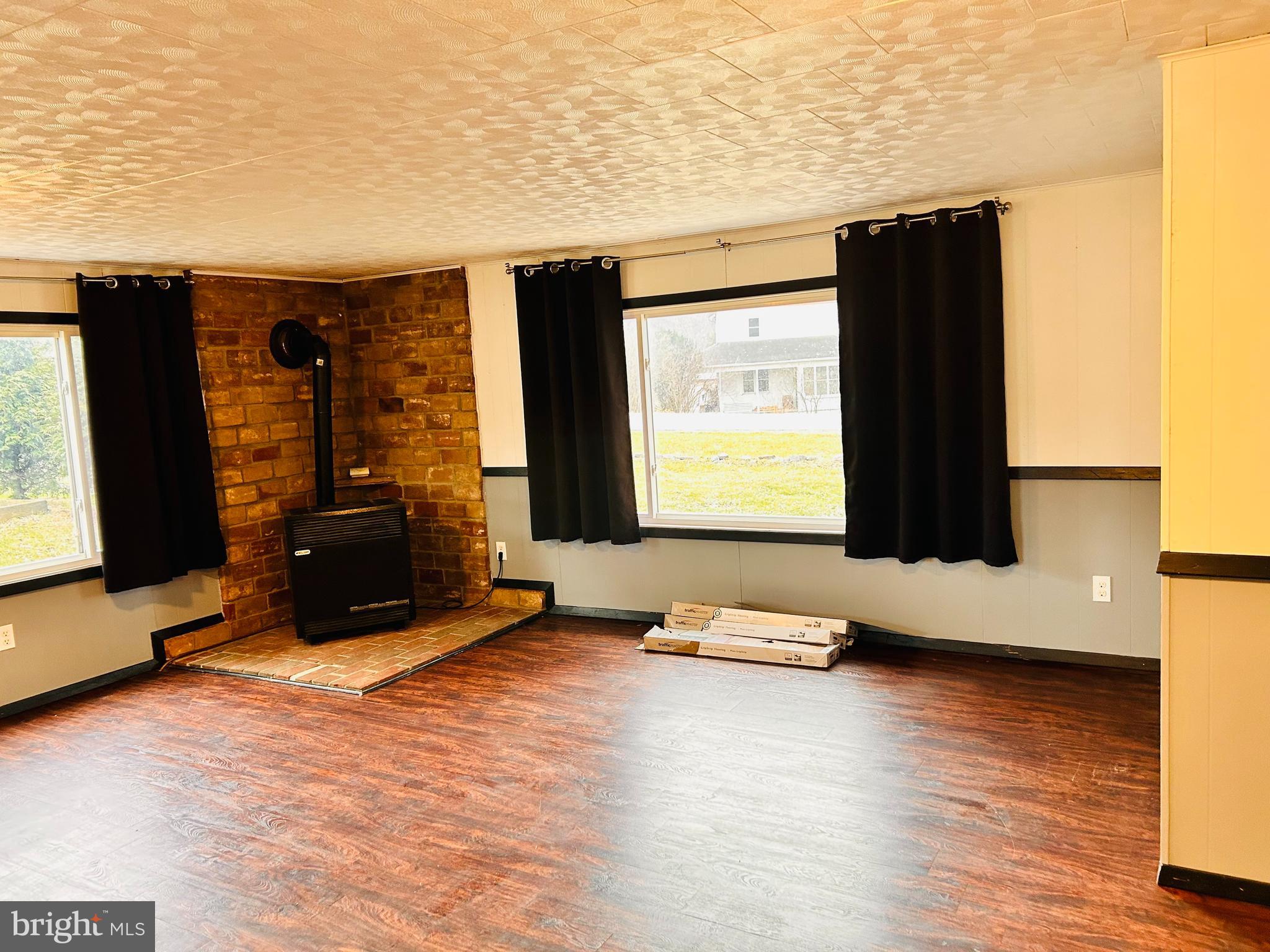 104 Apple Butter Road Aaronsburg, PA 16820 - Photo 20 of 33 a room with gym equipment and a large window