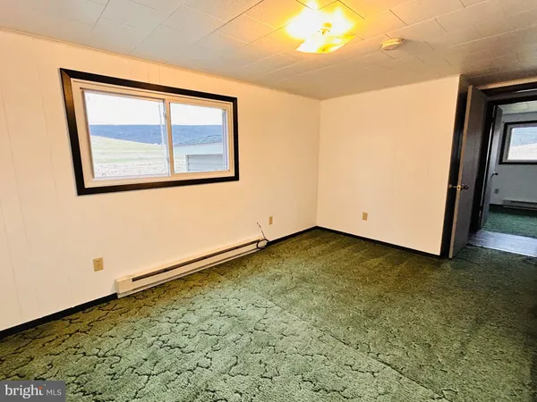 a view of an empty room with window