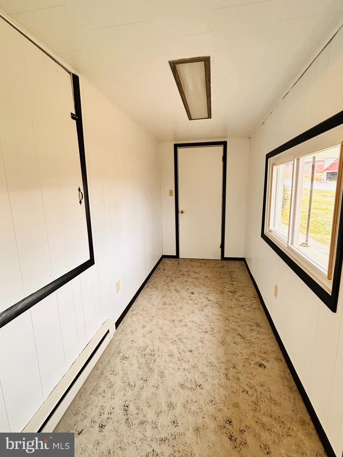 104 Apple Butter Road Aaronsburg, PA 16820 - Photo 24 of 33 a view of room with window and stairs