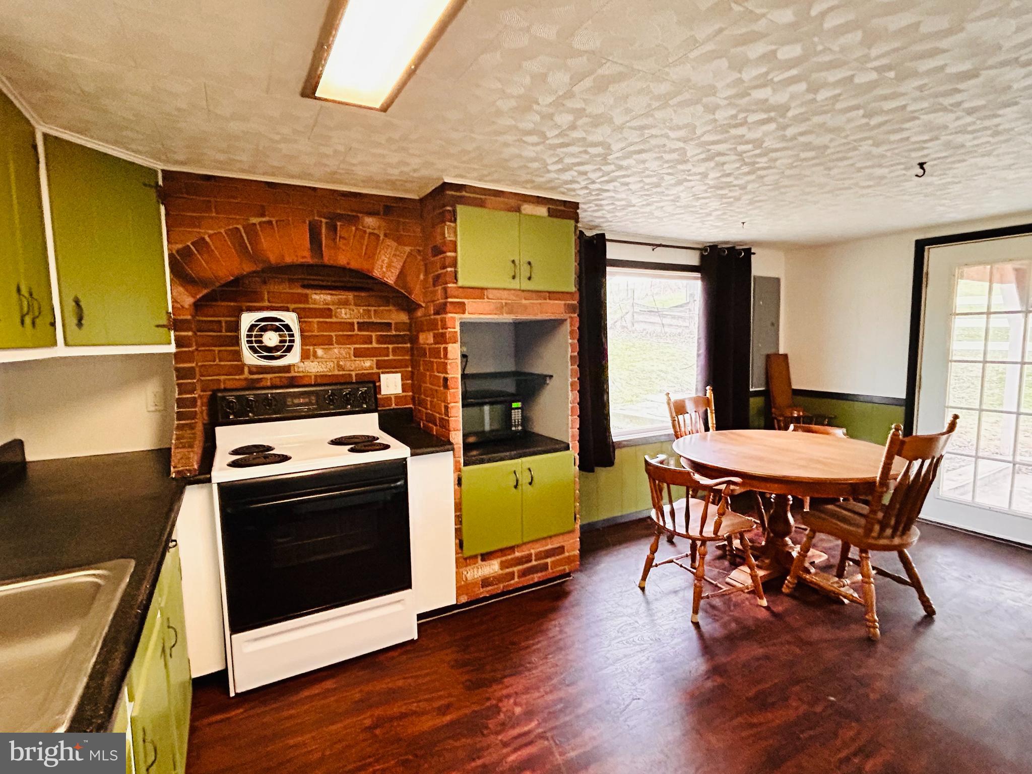 104 Apple Butter Road Aaronsburg, PA 16820 - Photo 29 of 33 a view of a dining room with furniture and window