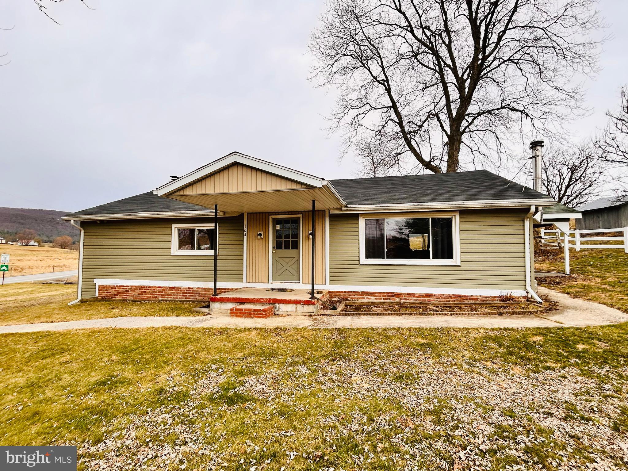104 Apple Butter Road Aaronsburg, PA 16820 - Photo 3 of 33 a front view of a house with a yard
