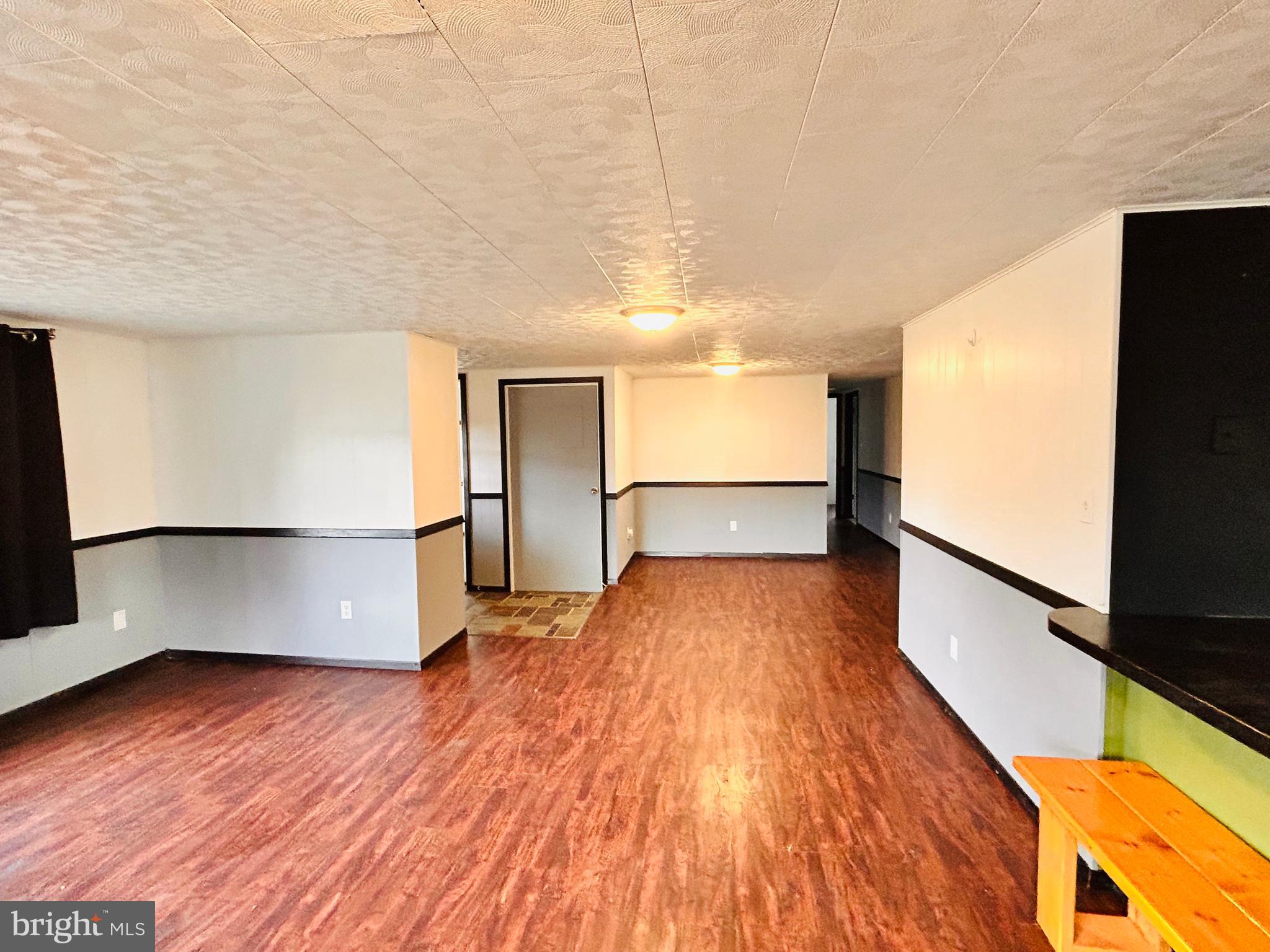 104 Apple Butter Road Aaronsburg, PA 16820 - Photo 31 of 33 a view of empty room with wooden floor