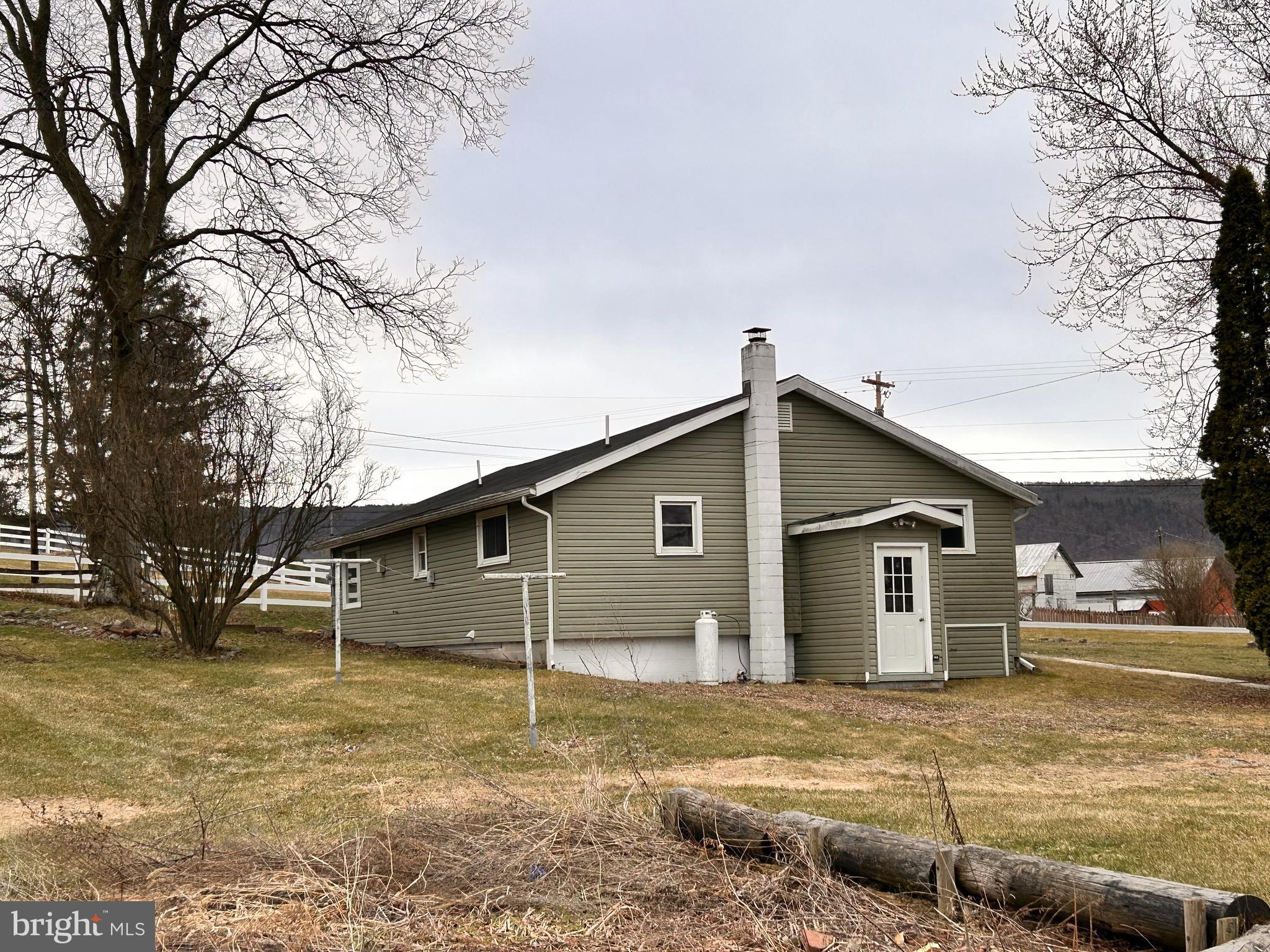 104 Apple Butter Road Aaronsburg, PA 16820 - Photo 5 of 33 a view of a house with a yard