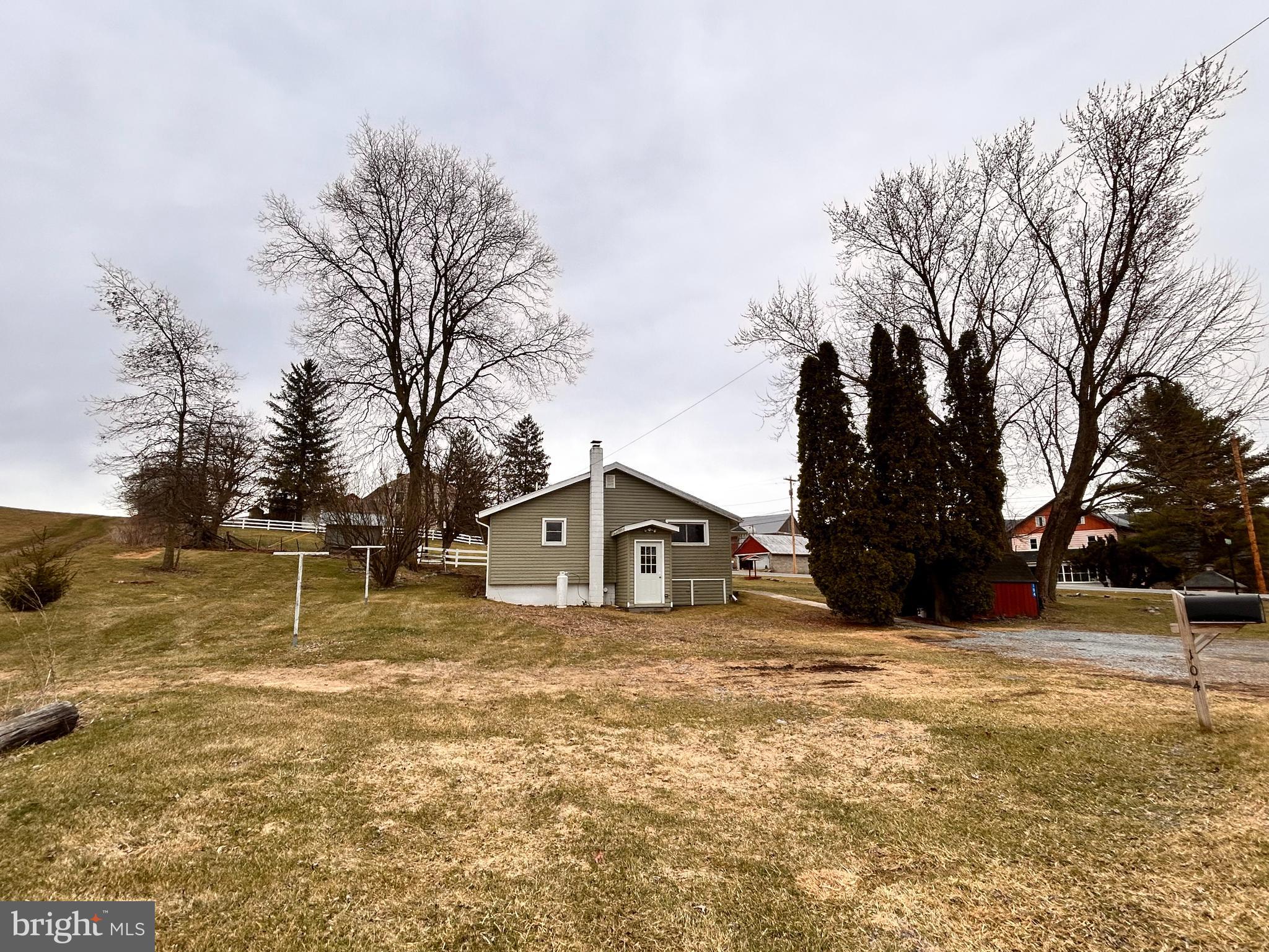 104 Apple Butter Road Aaronsburg, PA 16820 - Photo 6 of 33 a view of a house with a yard