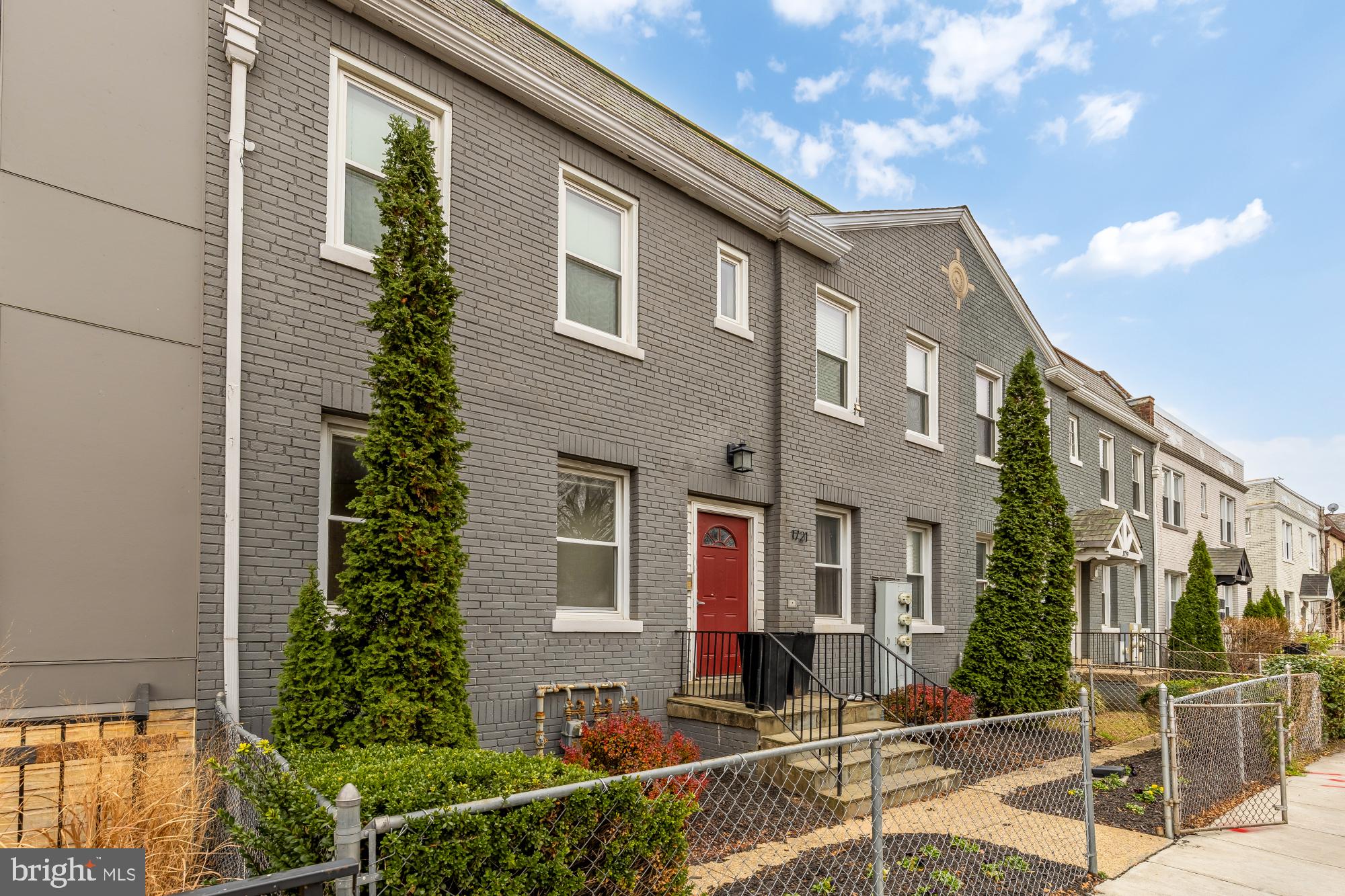 a front view of a house with street