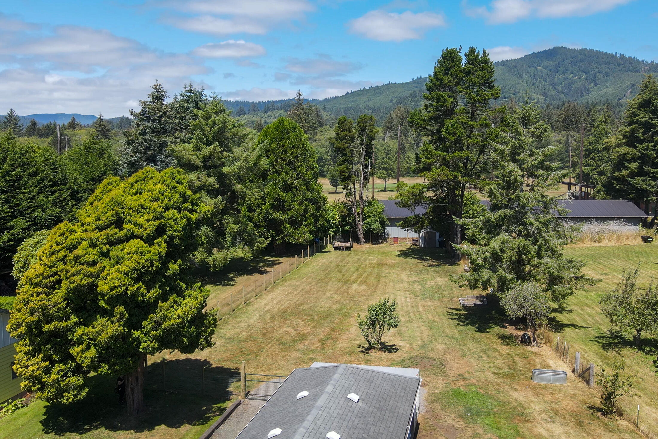 7330 Alderbrook Road Tillamook, OR 97141 - Photo 17 of 30 DRONE VIEW TOWARD MTNS & DRIVING RANGE