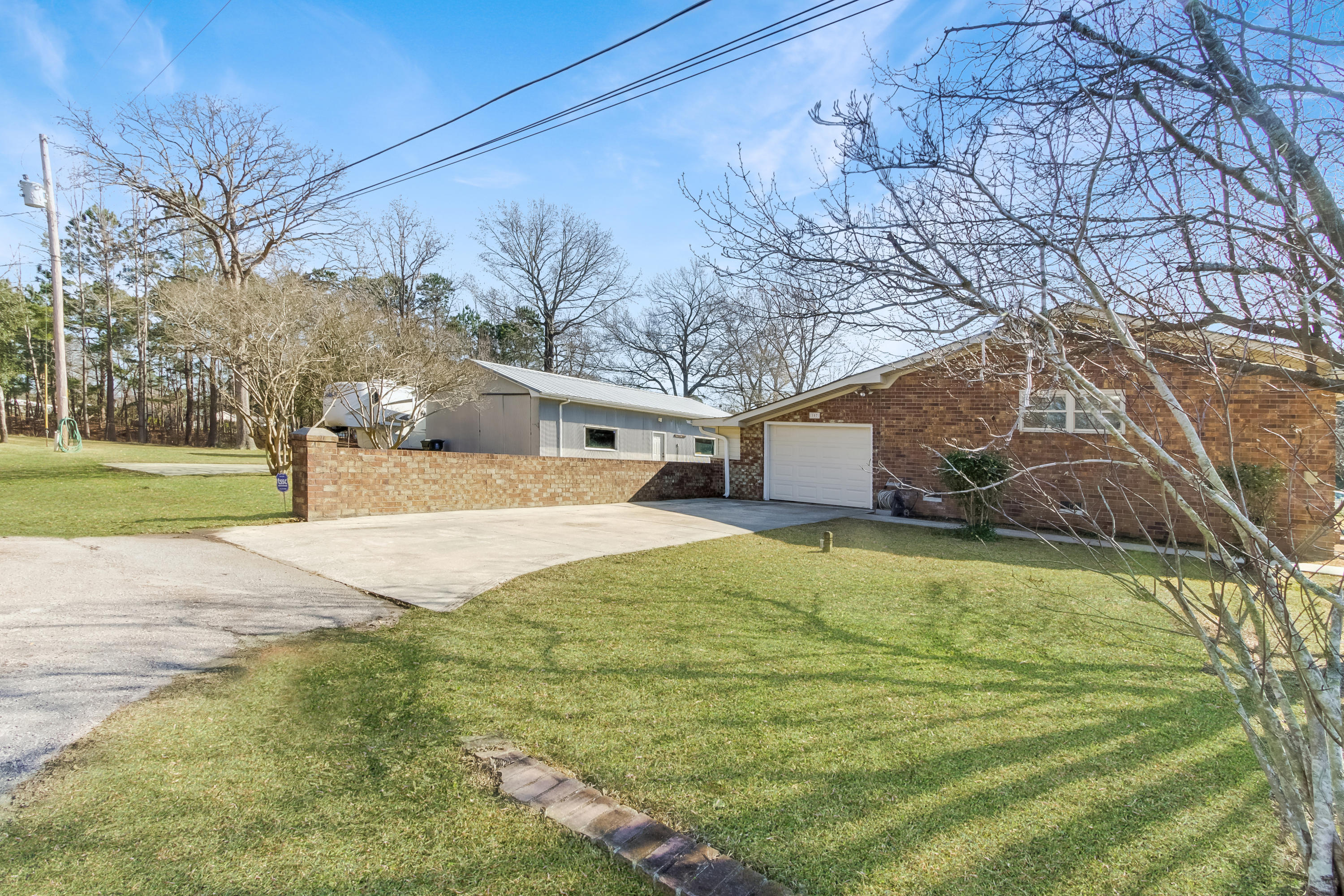 Standing on left edge of property