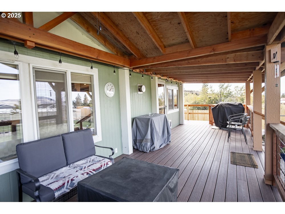 1208 Hill Street Cove, OR 97824 - Photo 17 of 33 a living room with furniture and a wooden floor