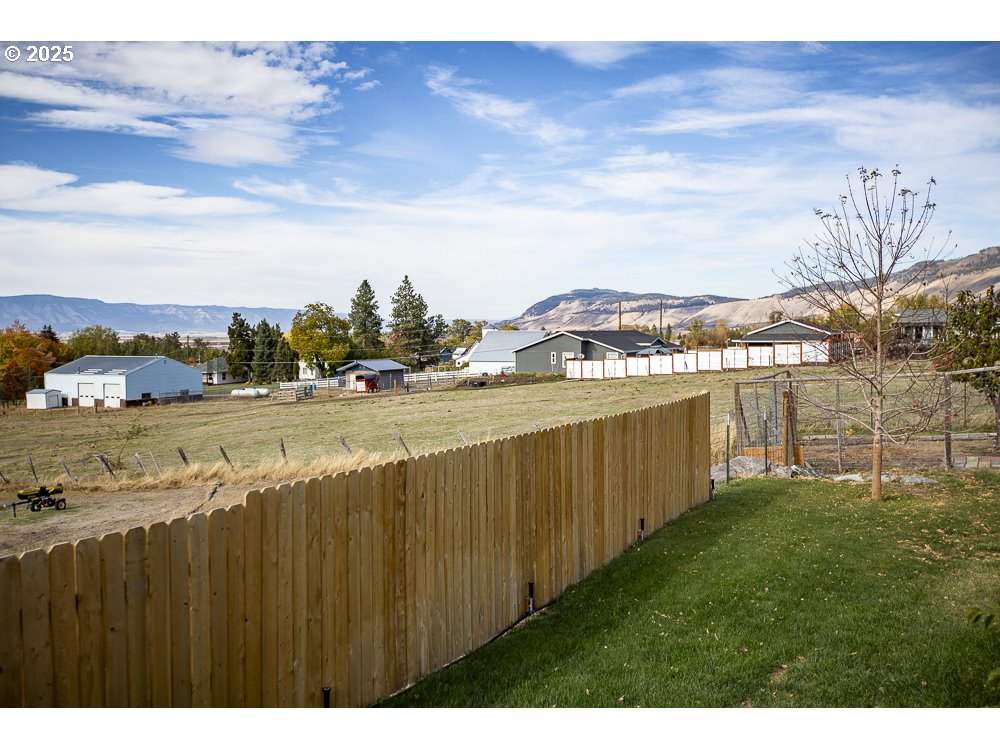1208 Hill Street Cove, OR 97824 - Photo 22 of 33 a view of lake with a big yard