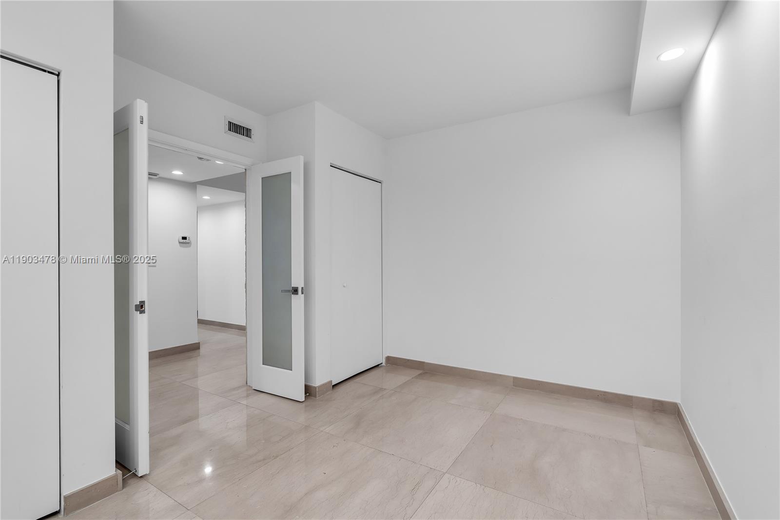 141 Crandon Boulevard, Unit 242 Key Biscayne, FL 33149 - Photo 12 of 42 a view of an empty room