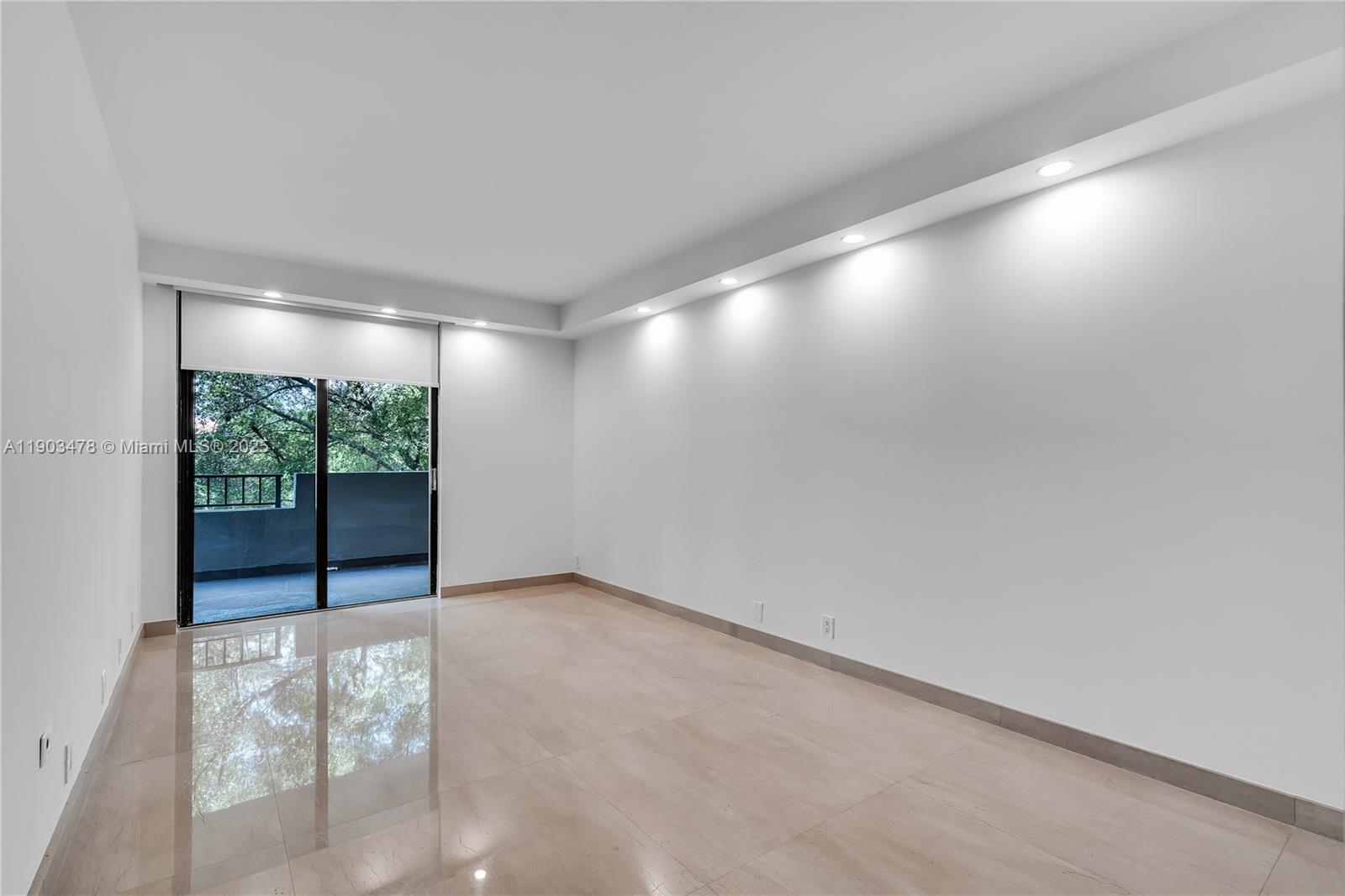 141 Crandon Boulevard, Unit 242 Key Biscayne, FL 33149 - Photo 16 of 42 a view of an empty room with a window