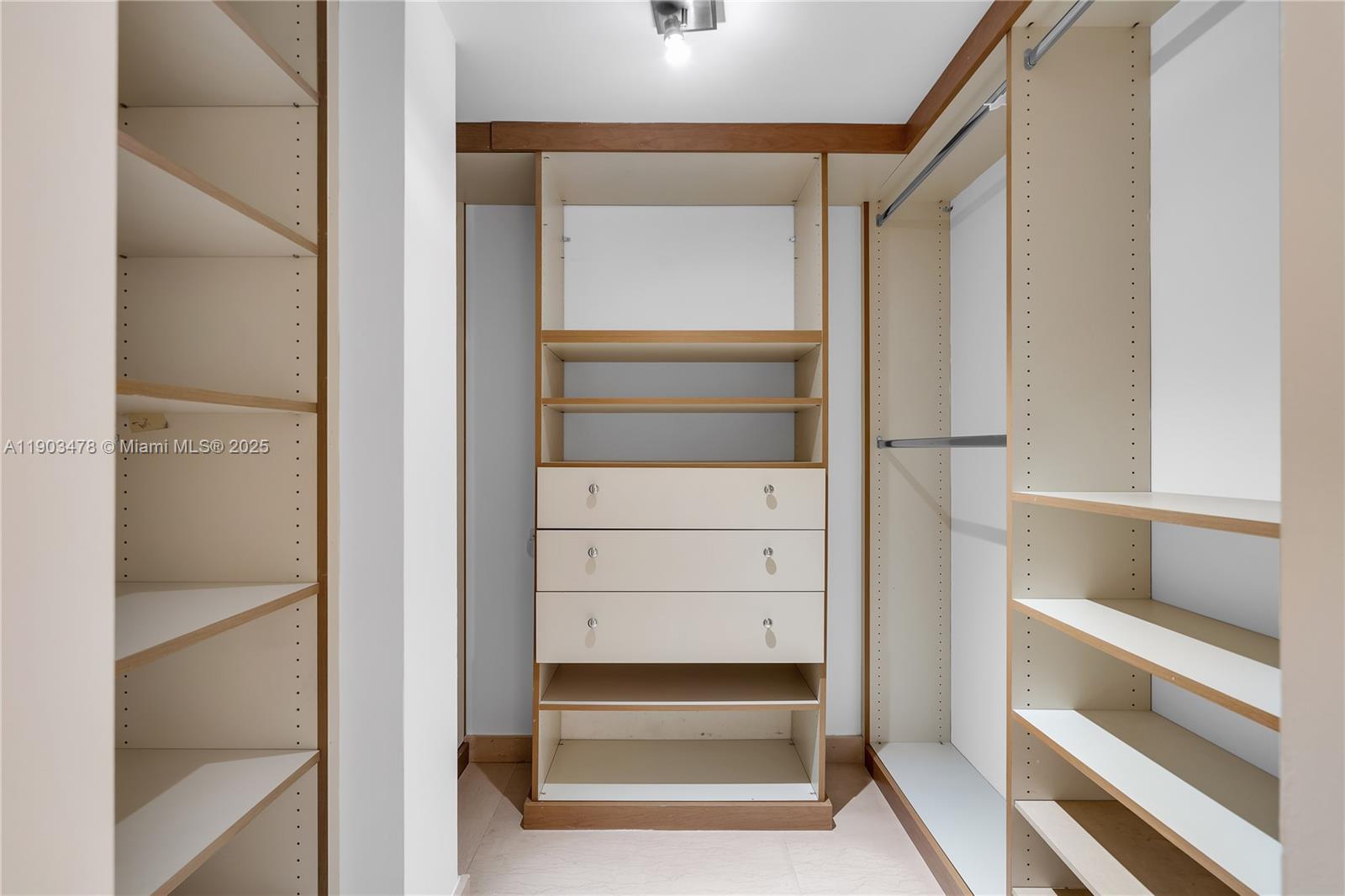 141 Crandon Boulevard, Unit 242 Key Biscayne, FL 33149 - Photo 19 of 42 a view of walk in closet