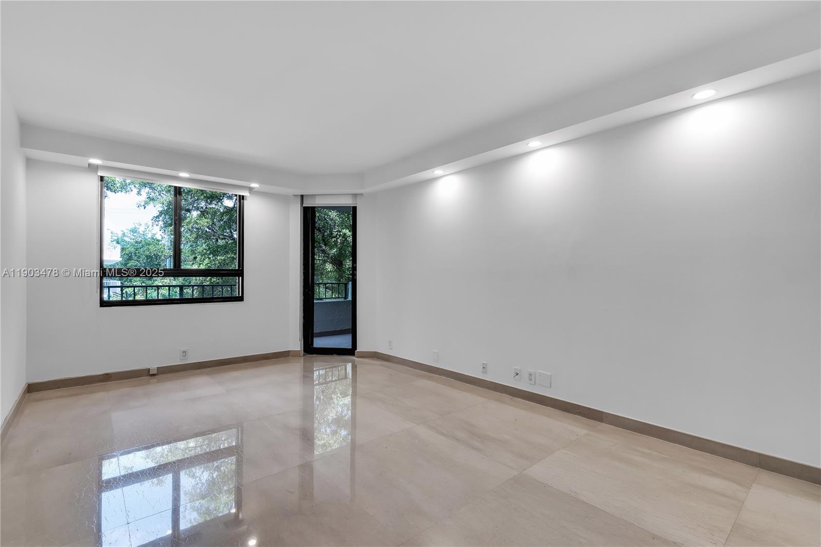 141 Crandon Boulevard, Unit 242 Key Biscayne, FL 33149 - Photo 23 of 42 an empty room with windows