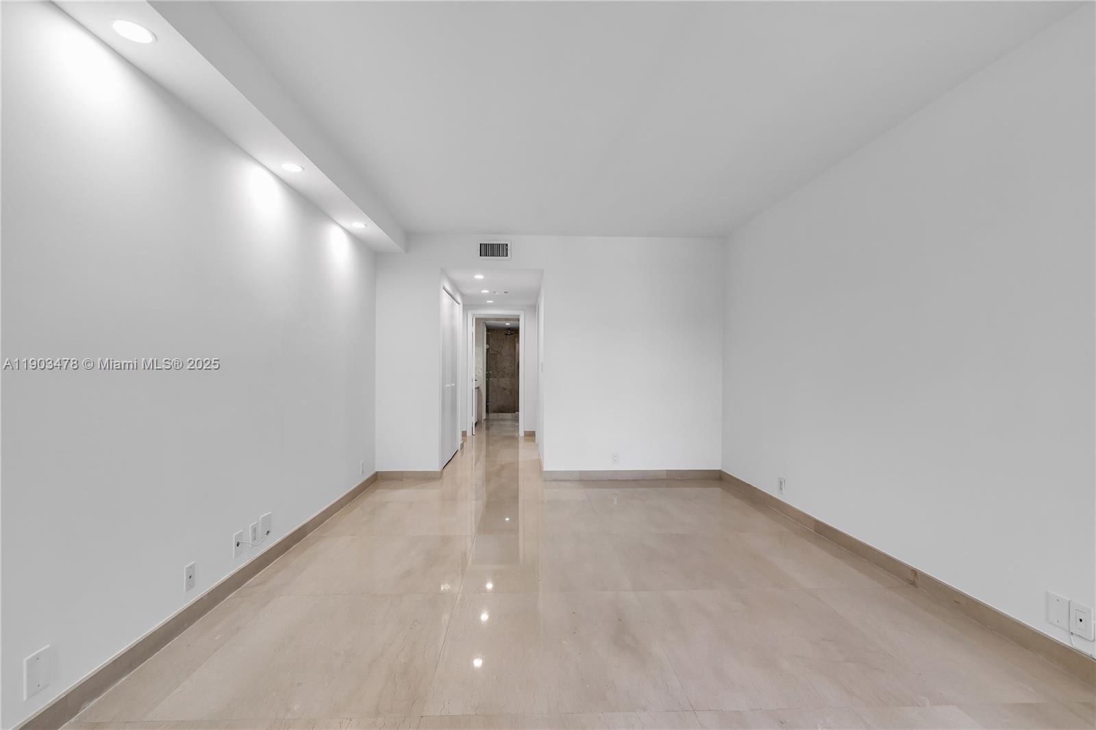141 Crandon Boulevard, Unit 242 Key Biscayne, FL 33149 - Photo 24 of 42 a view of a hallway