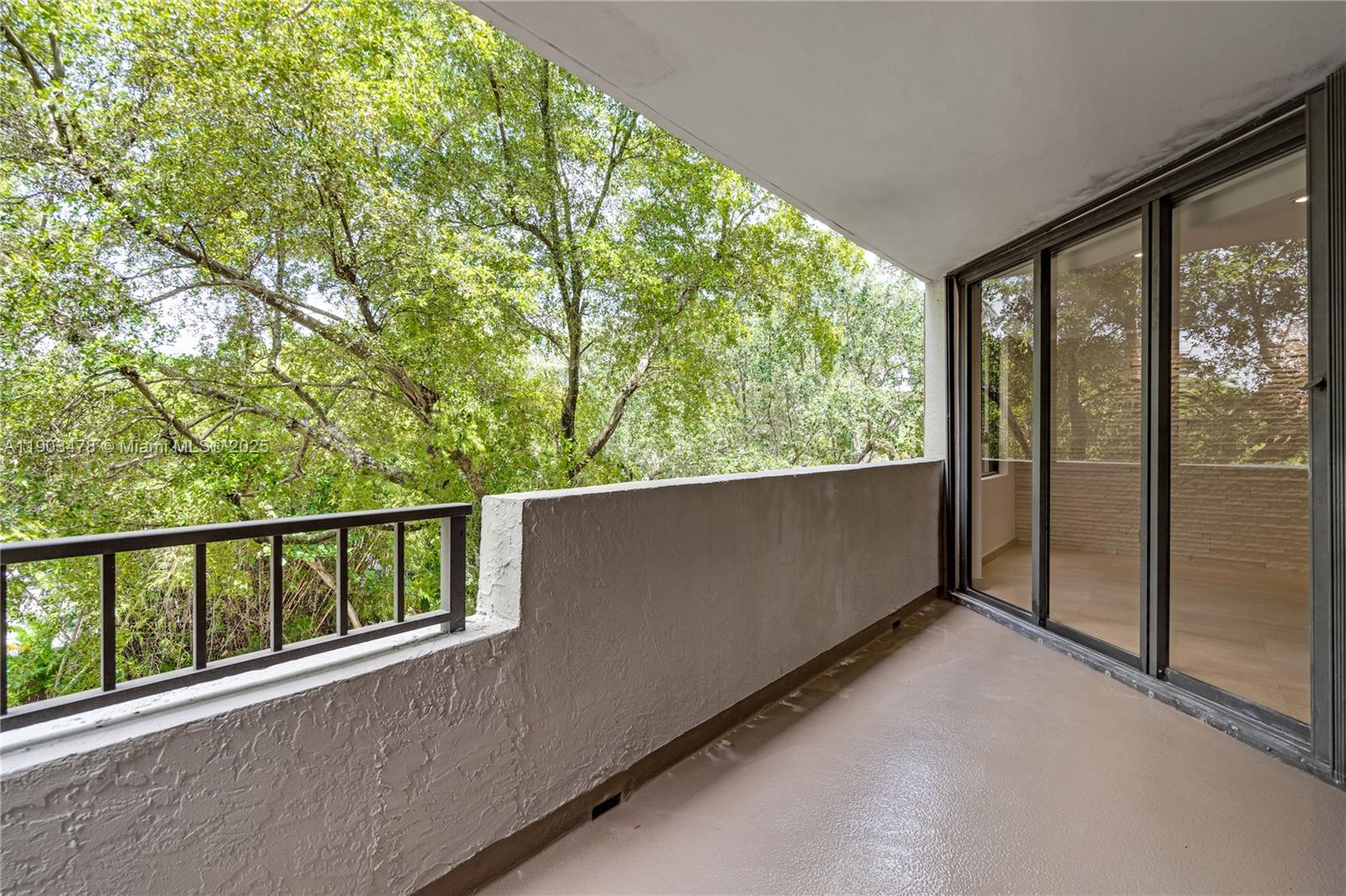 141 Crandon Boulevard, Unit 242 Key Biscayne, FL 33149 - Photo 30 of 42 a view of outdoor space with garden
