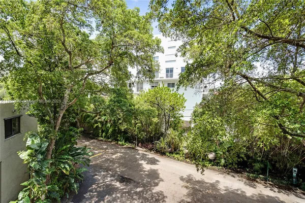 a view of a backyard with a patio