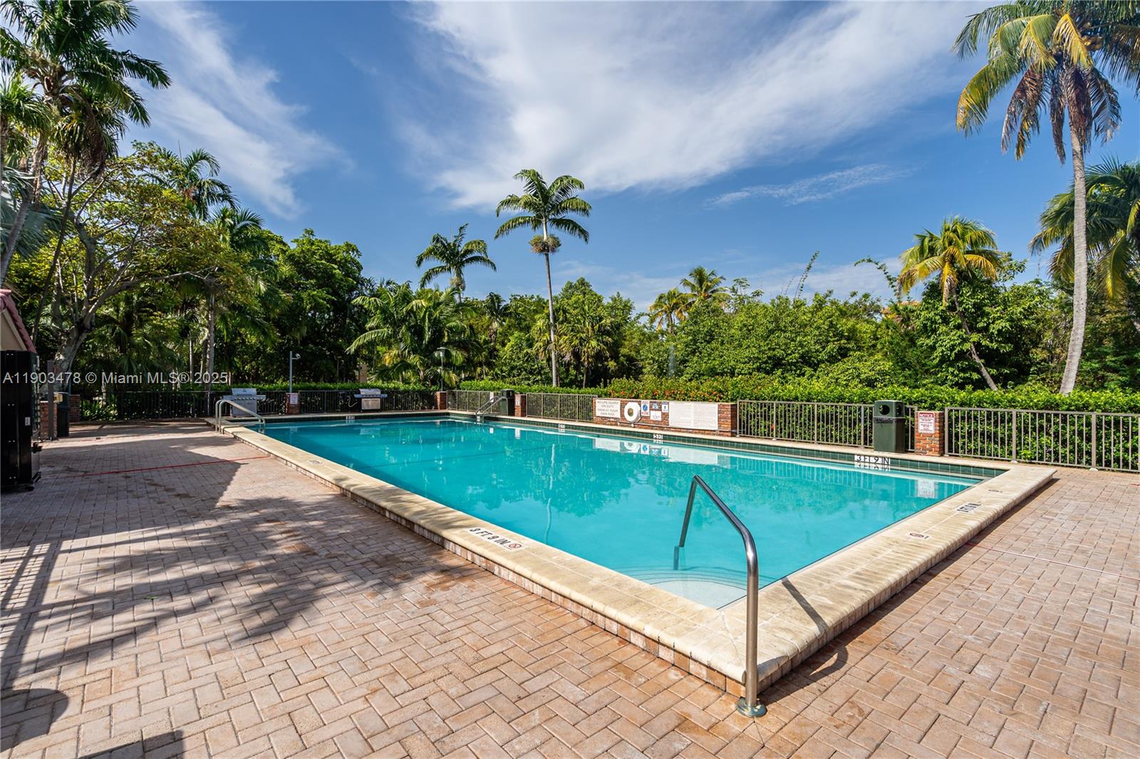141 Crandon Boulevard, Unit 242 Key Biscayne, FL 33149 - Photo 33 of 42 a view of a backyard with a patio