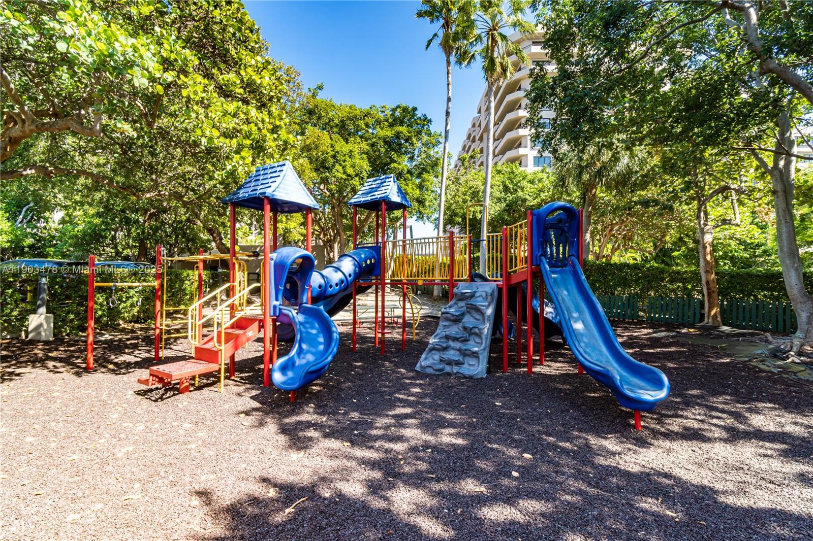 141 Crandon Boulevard, Unit 242 Key Biscayne, FL 33149 - Photo 40 of 42 a view of a park with slide