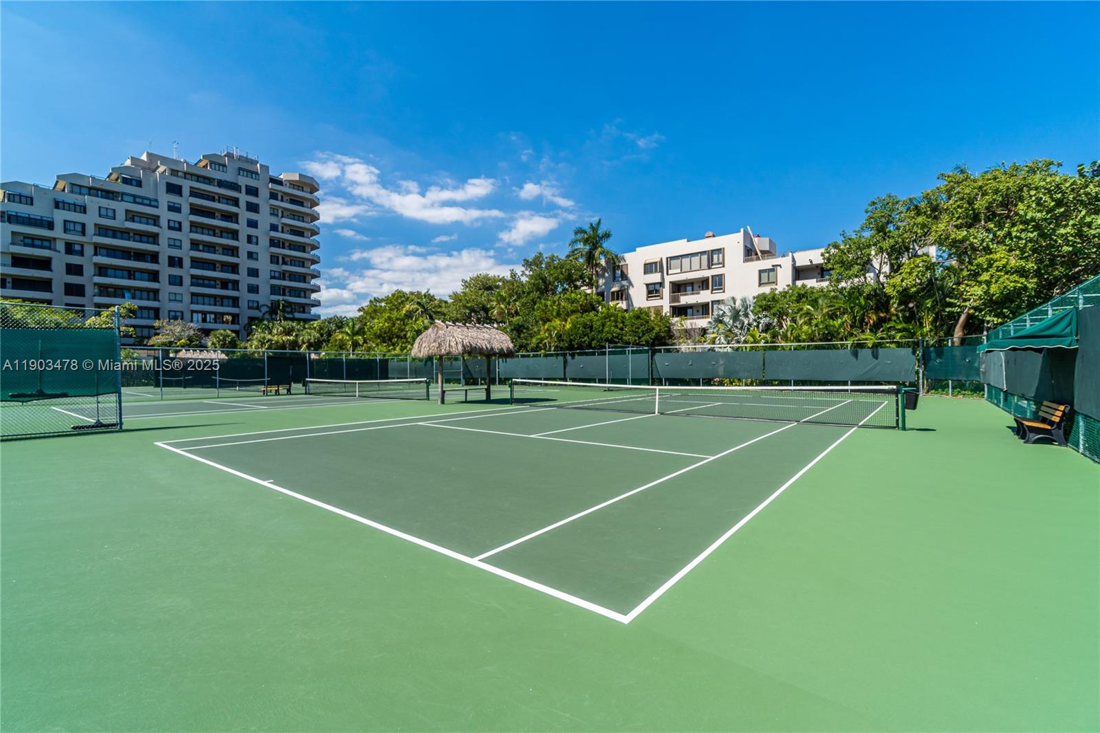 141 Crandon Boulevard, Unit 242 Key Biscayne, FL 33149 - Photo 41 of 42 a view of a tennis court